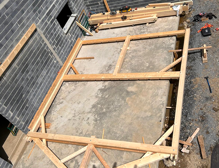 fabrication structure bois à même le sol